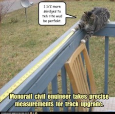 funny-pictures-monorail-civil-engineer-takes-precise-measurements-for-track-upgrade